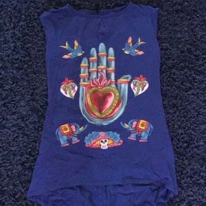 A blue shirt that was designed in Mexico